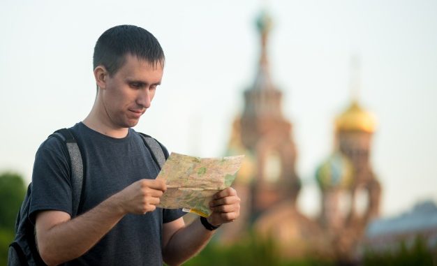 man looking at a map