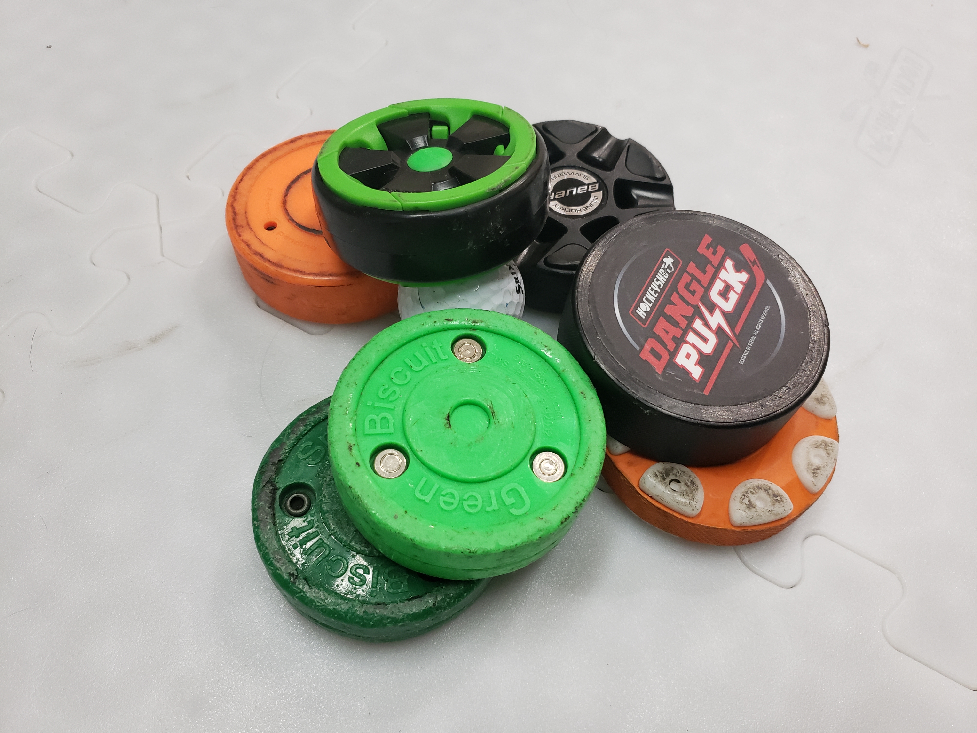 Off Ice Training Pucks Pile The Stick Guru